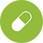 A small icon depicting a white and green vitamin supplement in pill form.